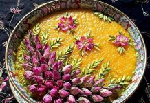 عکس تزیین شله زرد مجلسی با گل محمدی و خلال پسته